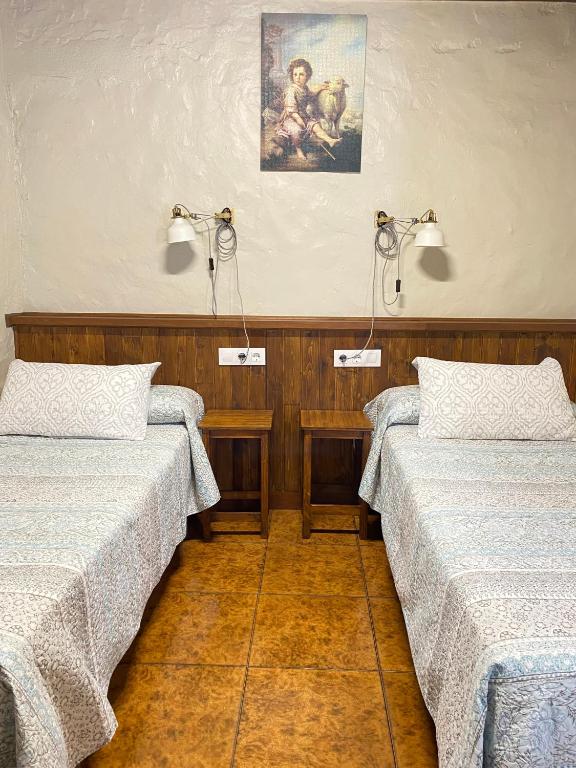 Postel nebo postele na pokoji v ubytování Casa Sara