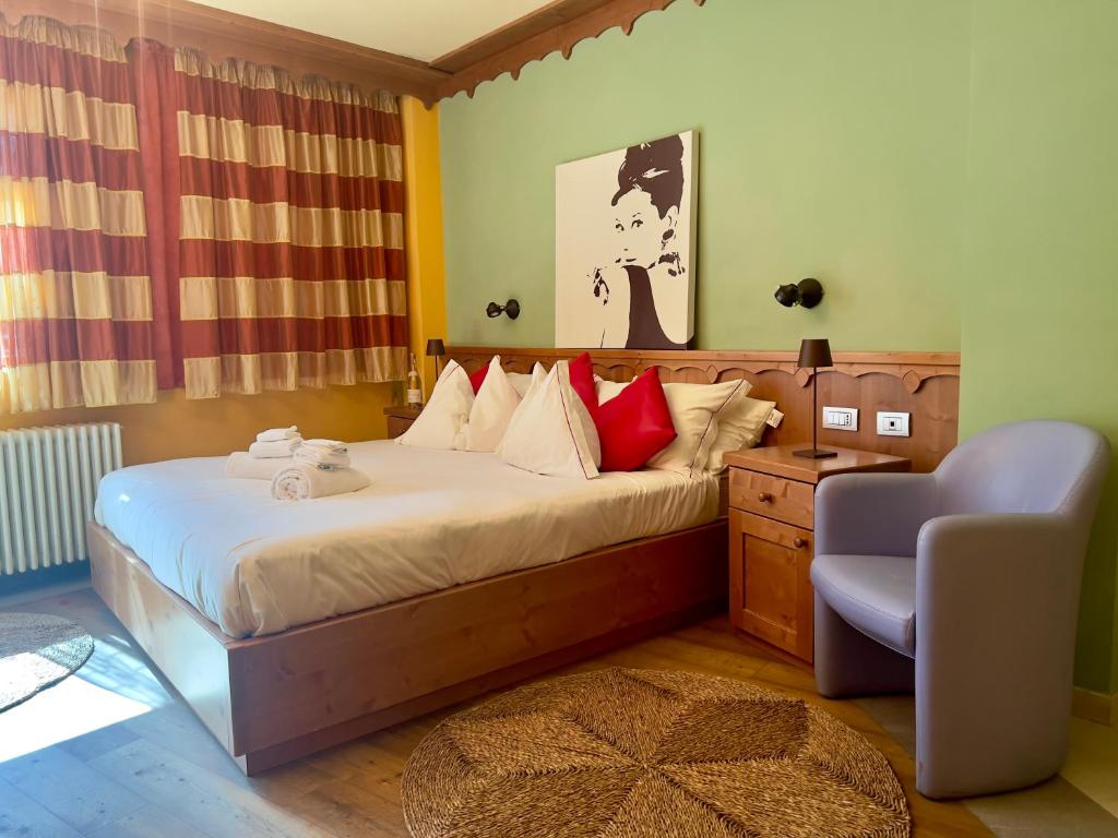 Postel nebo postele na pokoji v ubytování Nest Hotel Sestriere