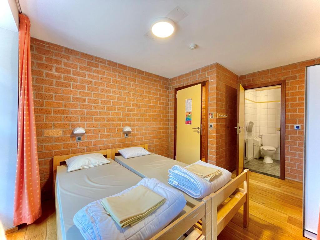 Postel nebo postele na pokoji v ubytování Gîte Kaleo Wanne