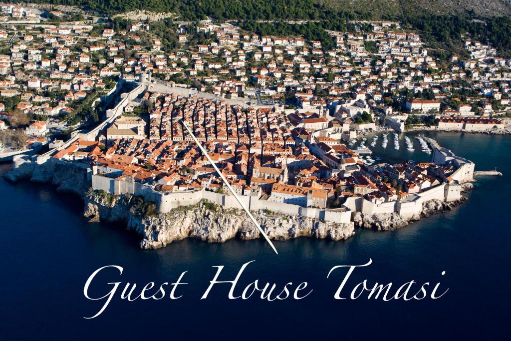 an aerial view of a small town on a island in the water at Guest House Tomasi in Dubrovnik
