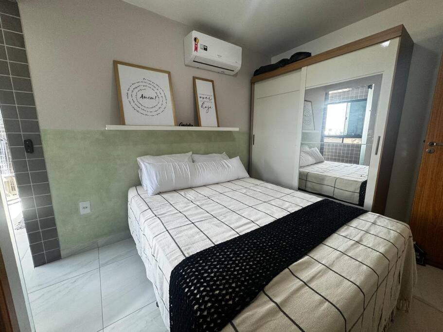 Postel nebo postele na pokoji v ubytování Acolhedor apto no Bessa