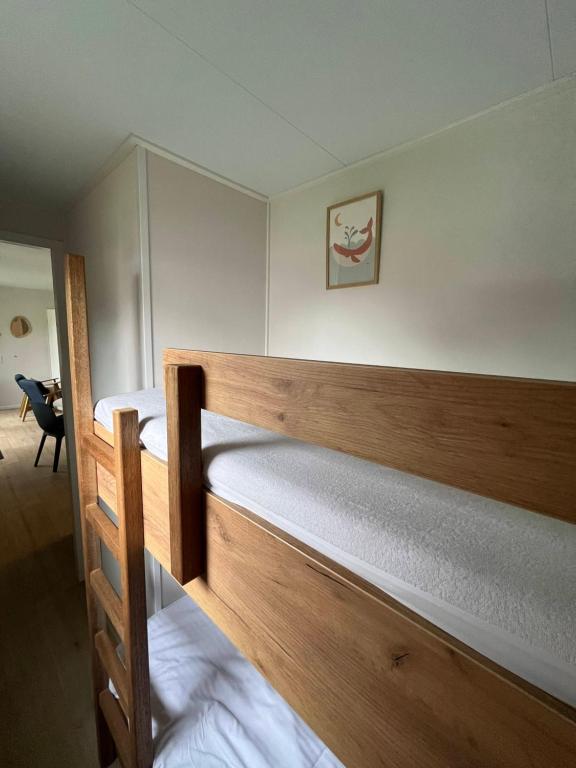 Postel nebo postele na pokoji v ubytování Chalet 't Zwaluwnest