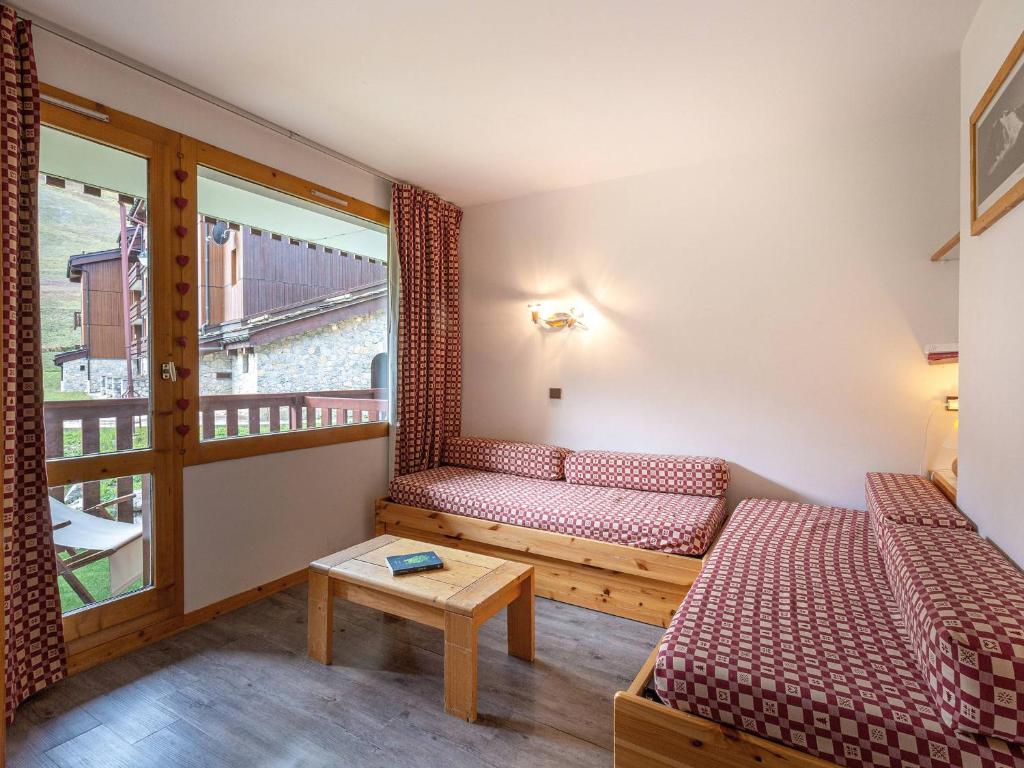 Ένα ή περισσότερα κρεβάτια σε δωμάτιο στο Studio ski-in/ski-out, balcon sud, cuisine équipée, 4 pers, animaux ok - FR-1-356-274