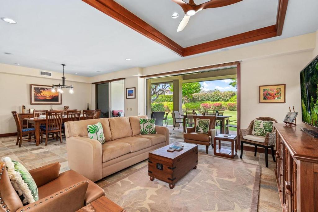 a living room with a couch and a table at 518 Villages at Mauna Lani in Waikoloa