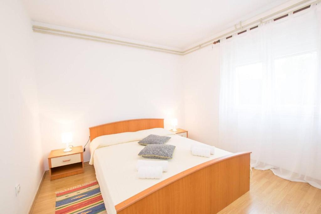 Postel nebo postele na pokoji v ubytování Family house with 2 apartments - Irma