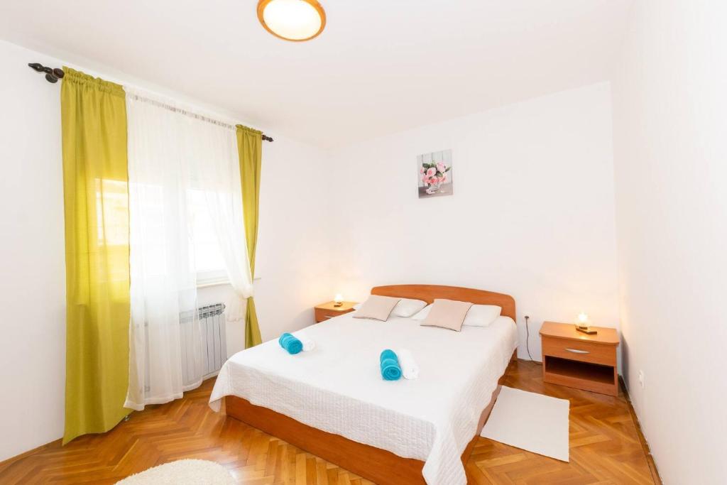 Postel nebo postele na pokoji v ubytování Family house with 2 apartments - Irma