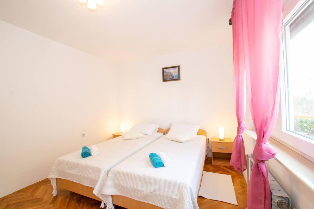 Postel nebo postele na pokoji v ubytování Family house with 2 apartments - Irma
