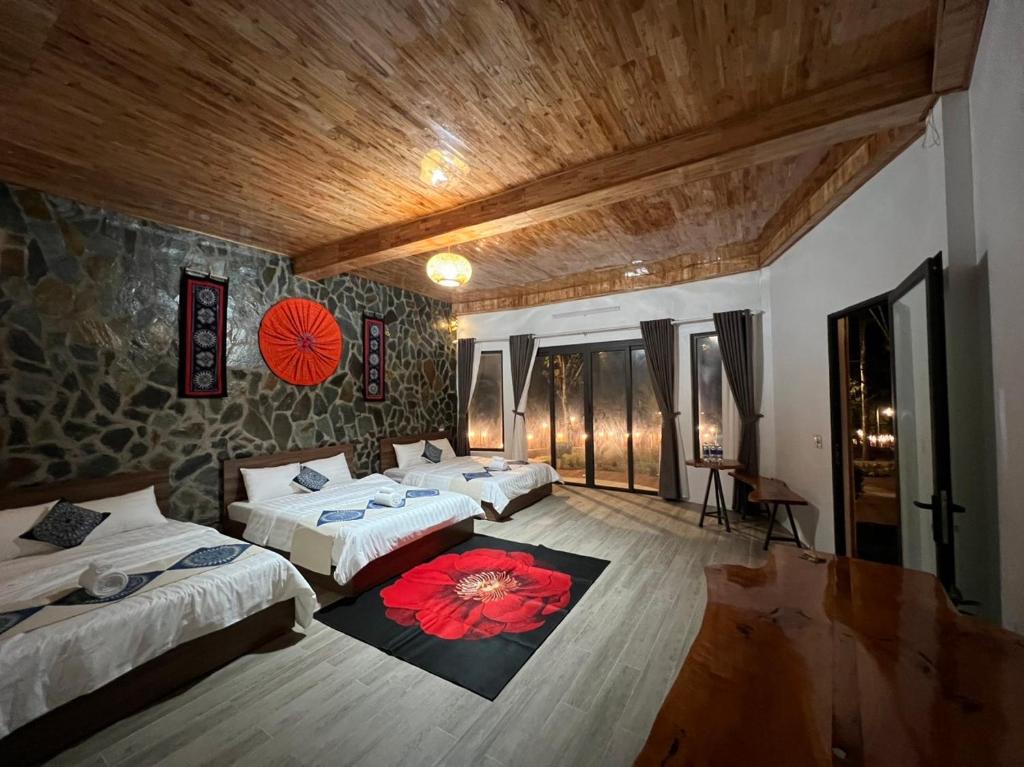 Ένα ή περισσότερα κρεβάτια σε δωμάτιο στο Mai Châu Friendly homestay