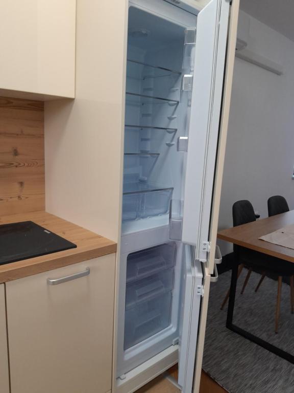 Kuchyň nebo kuchyňský kout v ubytování Apartma Dea