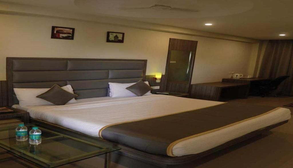 Postel nebo postele na pokoji v ubytování Hotel Royal Retreat
