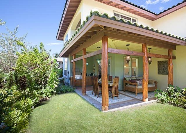 a porch of a house with a patio at 206 Fairways at Mauna Lani in Waikoloa