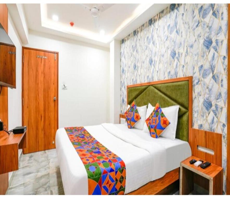 Postel nebo postele na pokoji v ubytování Hotel Nobel Inn