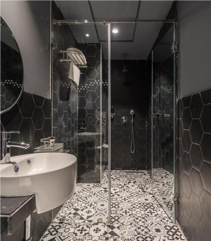 Koupelna v ubytování Hotel B plus L