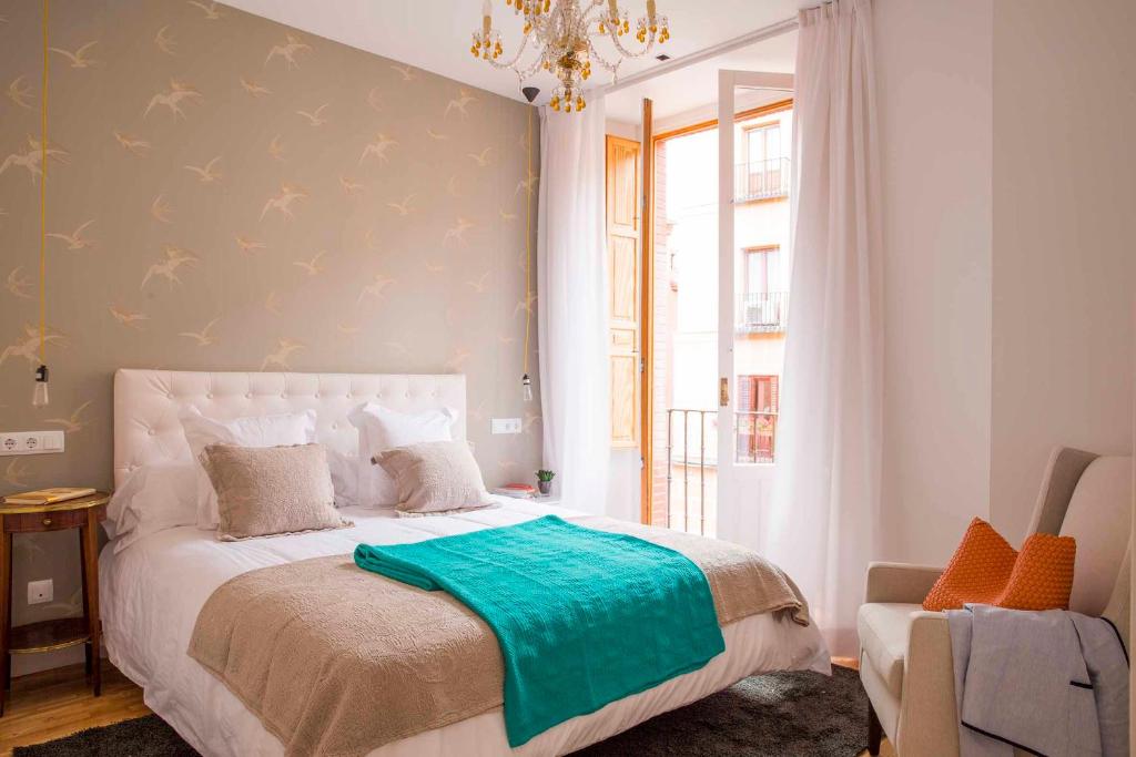 Cama o camas de una habitación en Palacio Conde Miranda