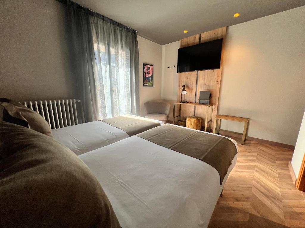 Letto o letti in una camera di Yomo Petit Paris