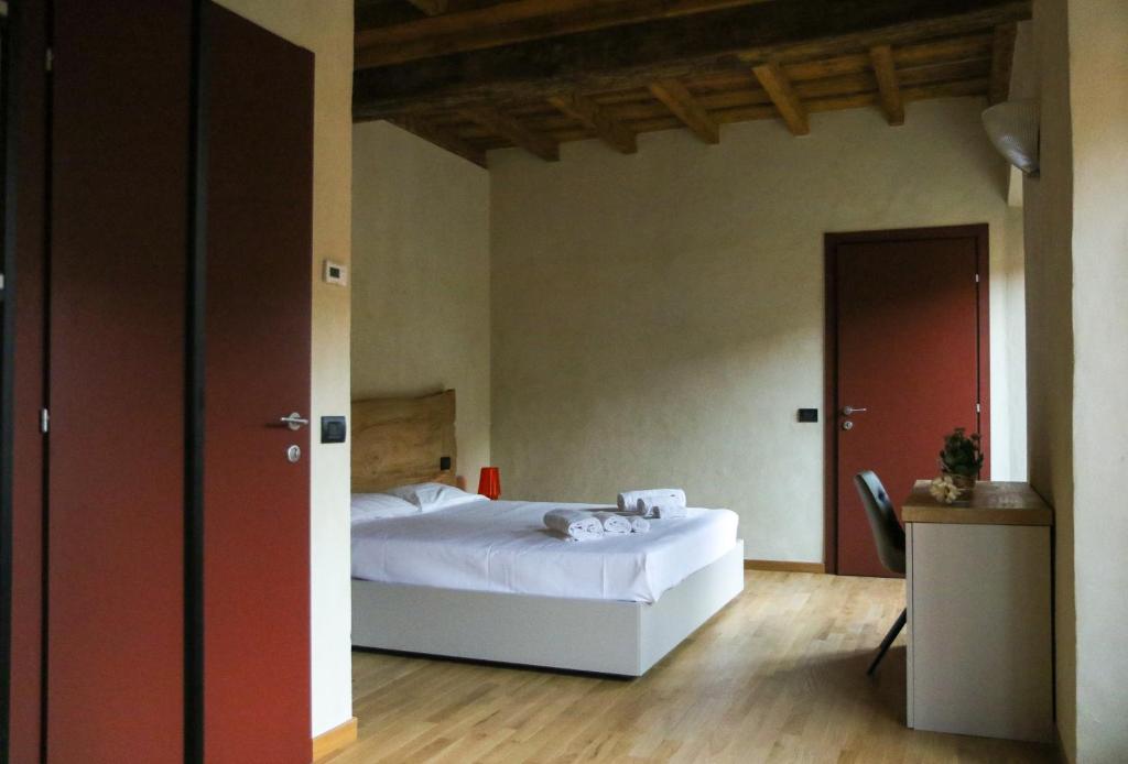 Postel nebo postele na pokoji v ubytování Il Carro Rooms - Monza Centro, Tribunale, Ospedale