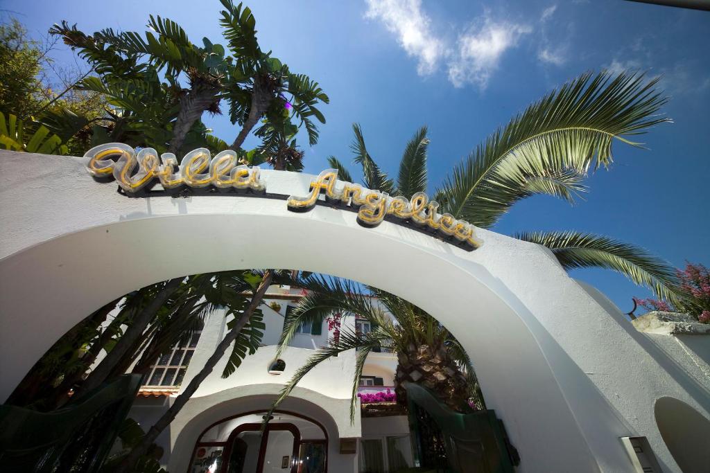 a building with a sign that reads hotel at Hotel Villa Angelica in Ischia