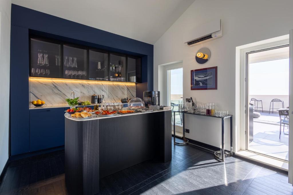Kuchyň nebo kuchyňský kout v ubytování Bluonly Boutique B&B