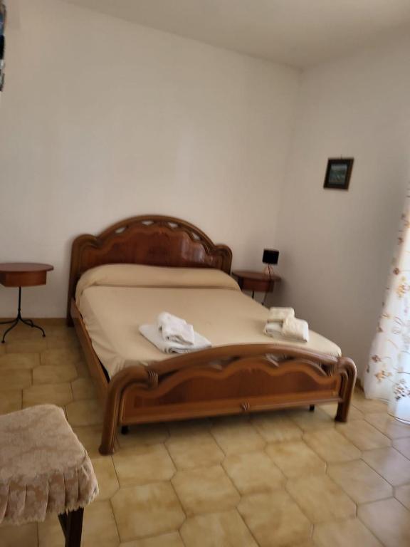 Postel nebo postele na pokoji v ubytování Appartamento Fotia