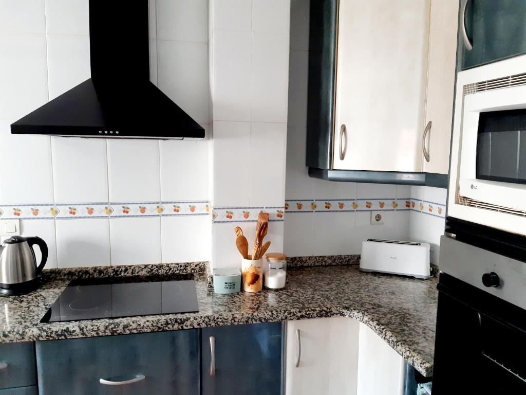 Kuchyň nebo kuchyňský kout v ubytování Apartamento Vernissa