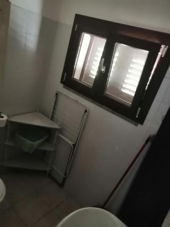Koupelna v ubytování Camera Serraona
