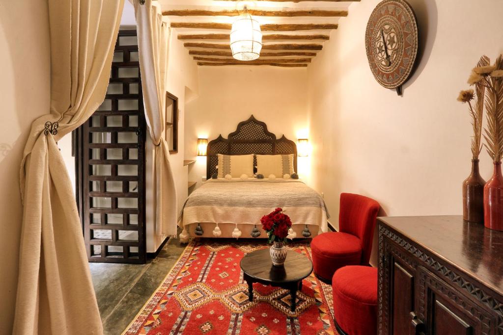 Postel nebo postele na pokoji v ubytování Marrakech Riads, Angsana Heritage Collection
