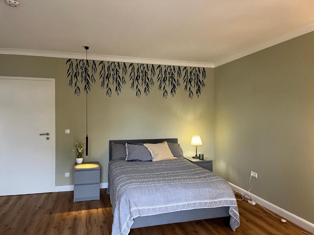 Postel nebo postele na pokoji v ubytování Leo Flat