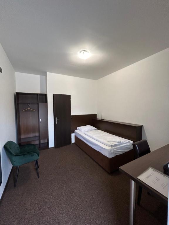 Postel nebo postele na pokoji v ubytování Motel R10