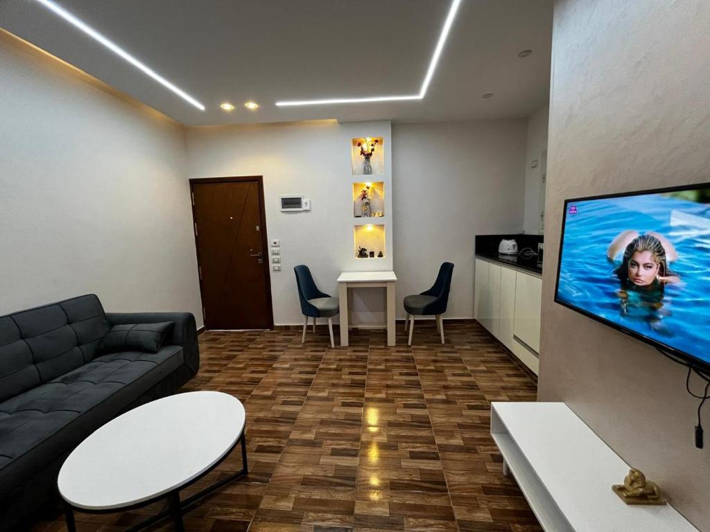 TV a/nebo společenská místnost v ubytování Sadam Luxury apartment