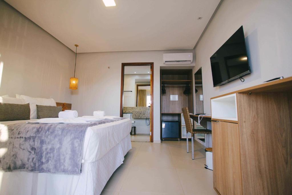TV a/nebo společenská místnost v ubytování Oiti Beach Resort Tutoia