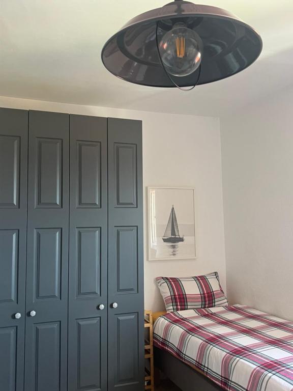 Postel nebo postele na pokoji v ubytování 1 person Studio - Casa Teresita