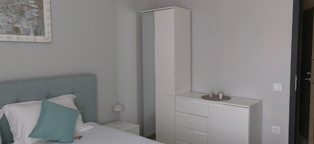Postel nebo postele na pokoji v ubytování Apartmenthaus Oborishte - 17