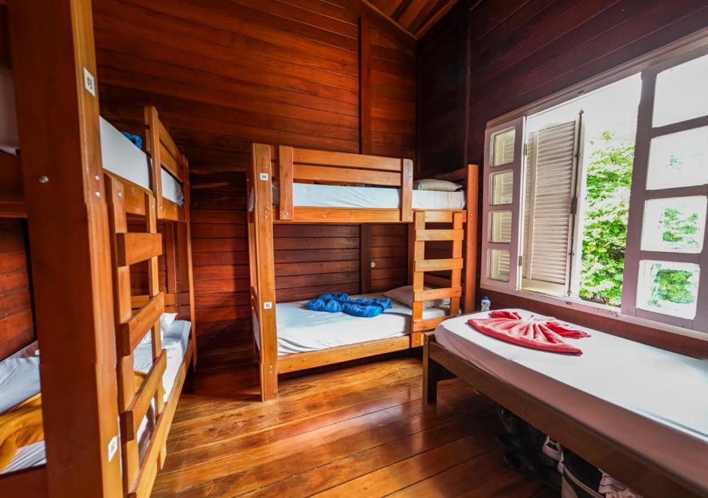 Postel nebo postele na pokoji v ubytování Woods Hostel