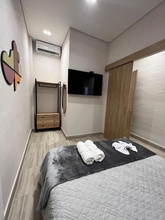 Postel nebo postele na pokoji v ubytování Zentrico Boutique
