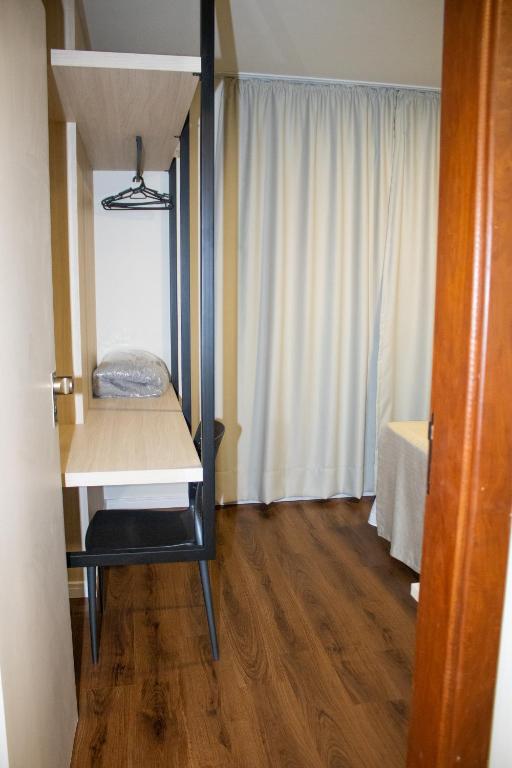 Postel nebo postele na pokoji v ubytování Golden Ingá Hotel