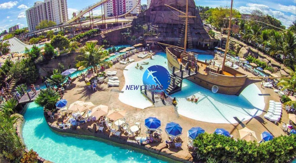 Πισίνα στο ή κοντά στο Piazza diRoma Flat - Com Acesso Livre ao diRoma Acqua Park Splash e Silde