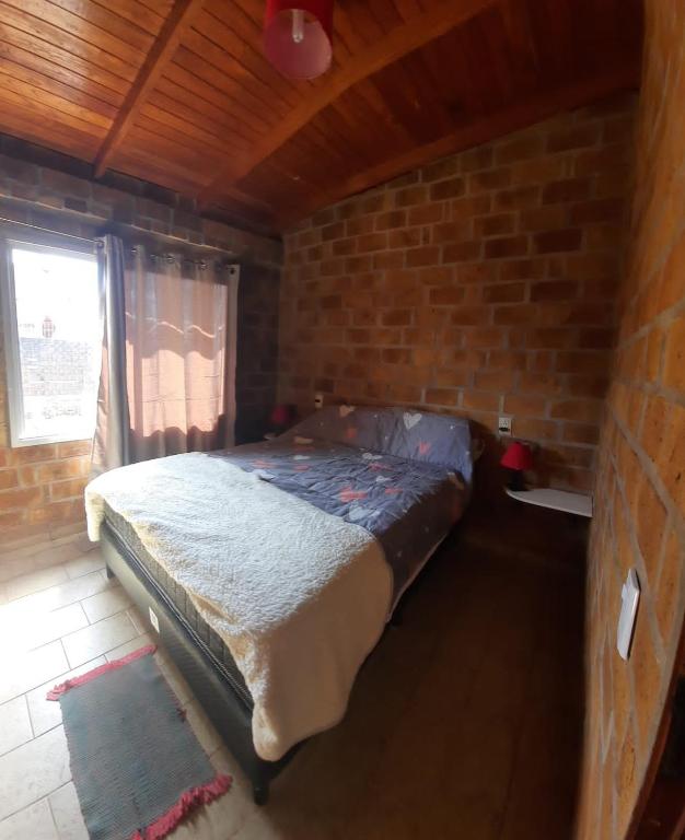 Postel nebo postele na pokoji v ubytování Casa 2 dormitorios B