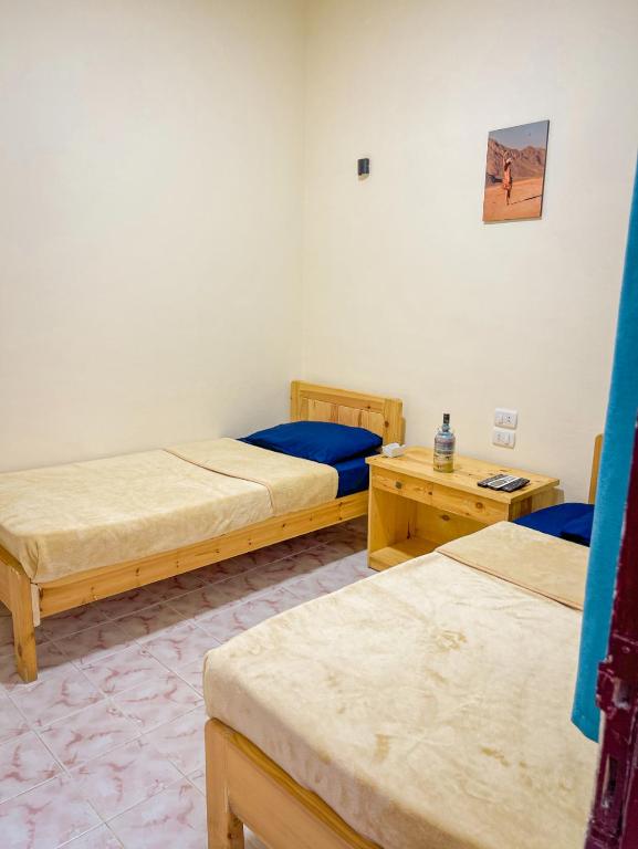 Postel nebo postele na pokoji v ubytování Miramar Camp Dahab