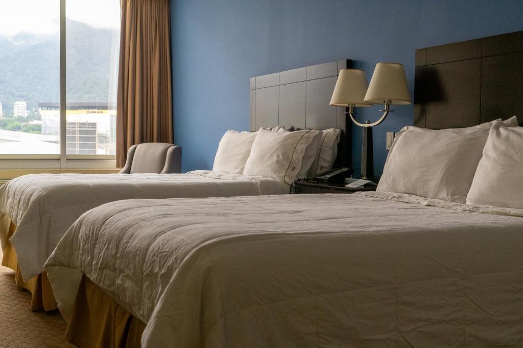 Postel nebo postele na pokoji v ubytování Intercity Hotels San Pedro Sula