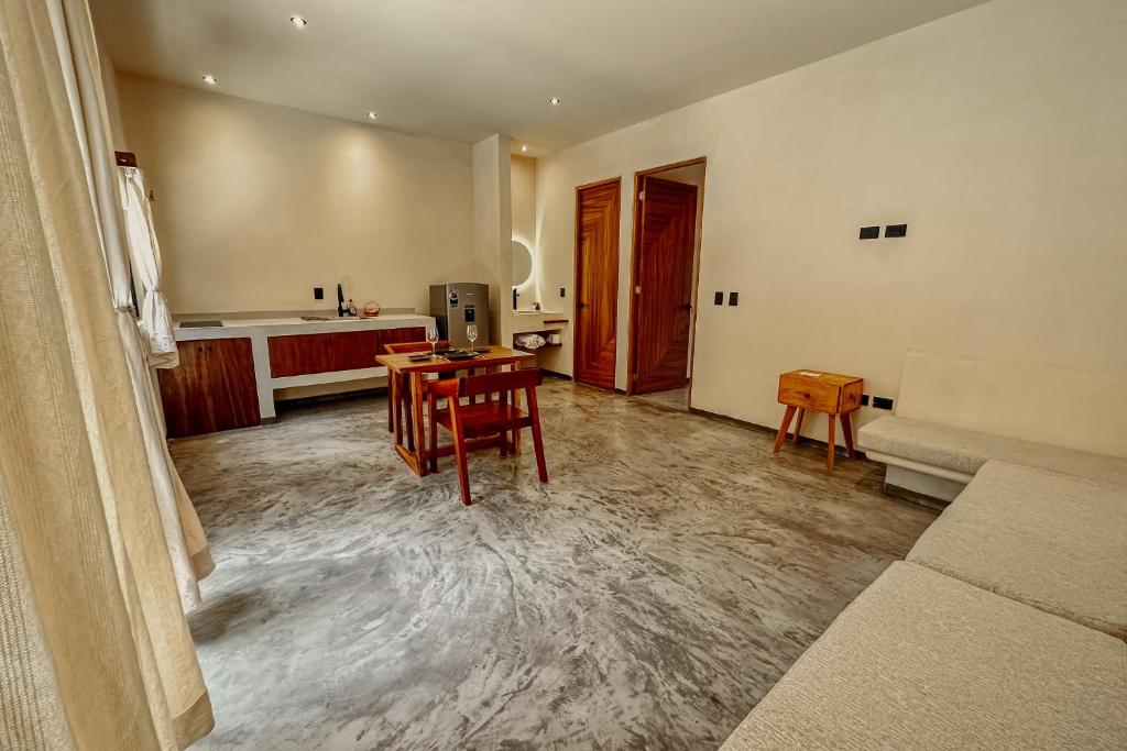 Posezení v ubytování Casa Kobaab Tulum