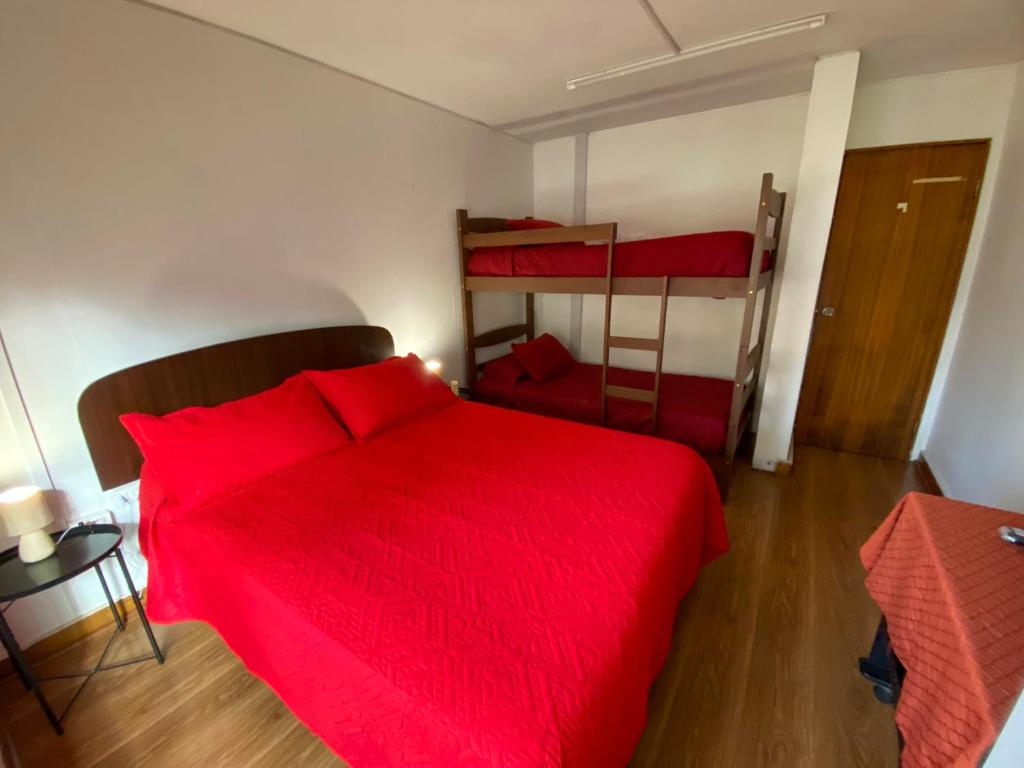 Postel nebo postele na pokoji v ubytování Hostal EntreOrientes