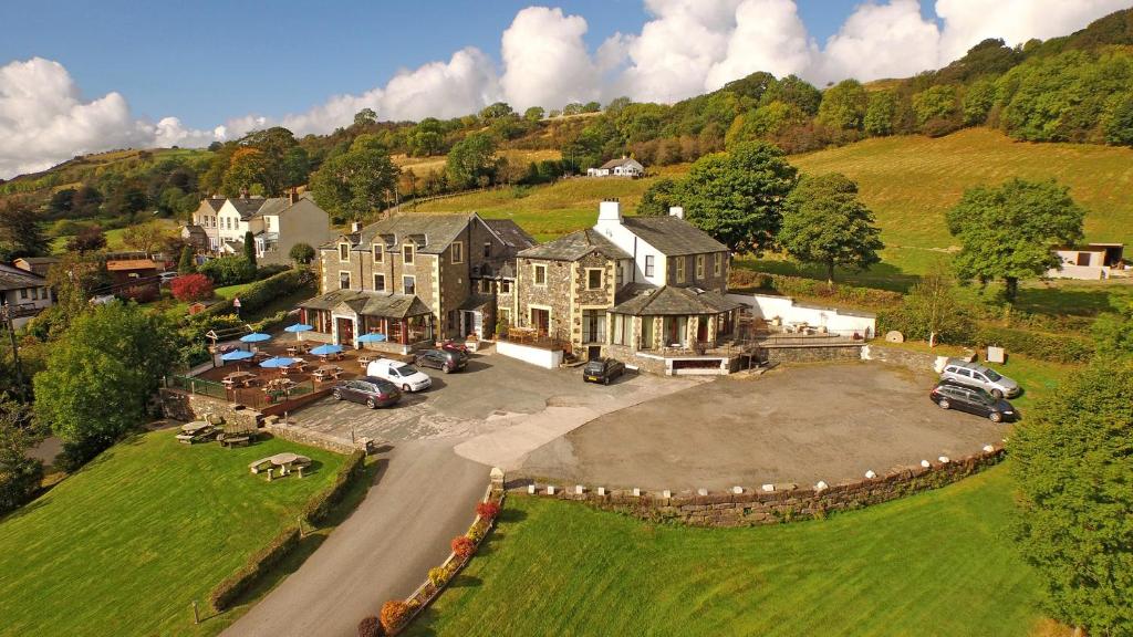 an aerial view of a large house on a hill at Embleton Spa Hotel & Apartments in Embleton