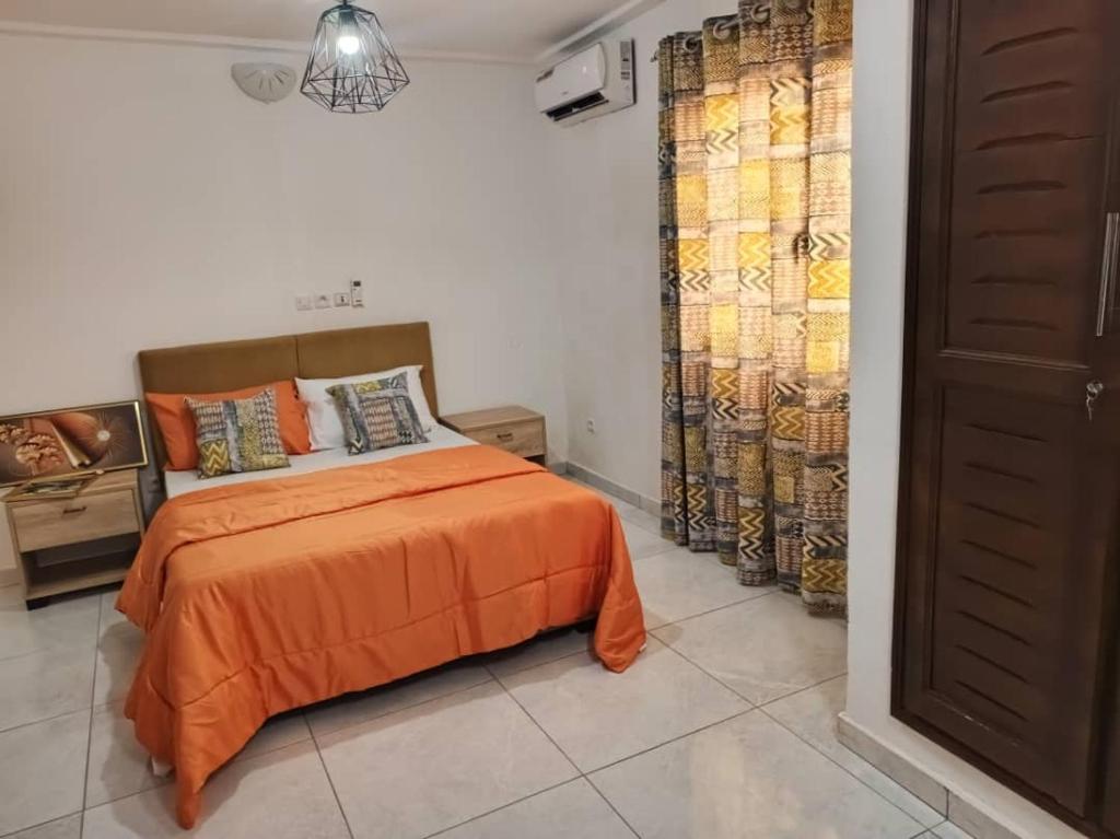 Ένα ή περισσότερα κρεβάτια σε δωμάτιο στο Venez découvrir un cadre idéal