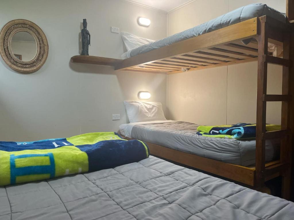 Voodi või voodid majutusasutuse Global Village Travellers Lodge toas