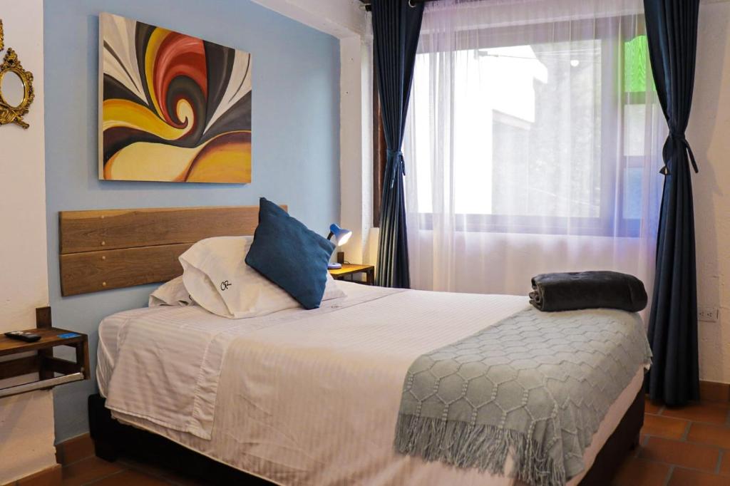 Postel nebo postele na pokoji v ubytování Casa El Retiro - Villa de Leyva