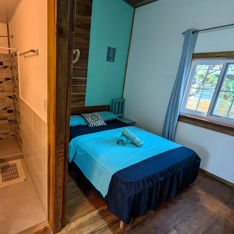 Postel nebo postele na pokoji v ubytování Casa Pelicano