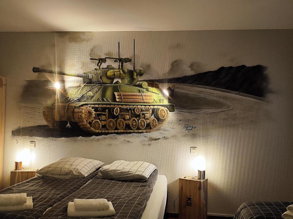 Postel nebo postele na pokoji v ubytování Le Sherman