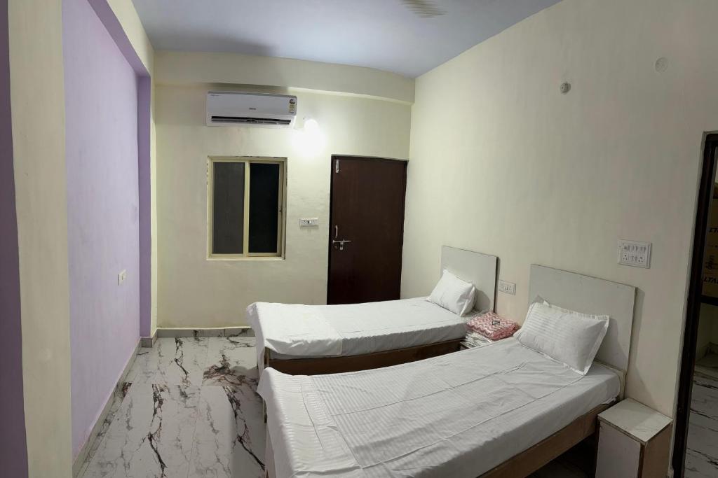 Letto o letti in una camera di BSSN Guest House