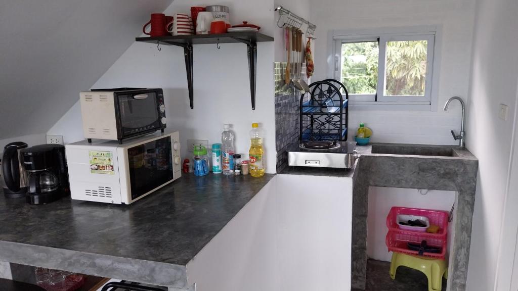Kuchyň nebo kuchyňský kout v ubytování Juliet Home Samui - Adult only