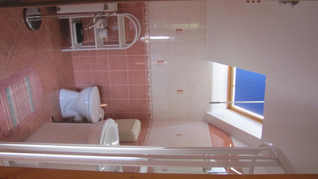 Koupelna v ubytování Alsóhegyi Apartmanok